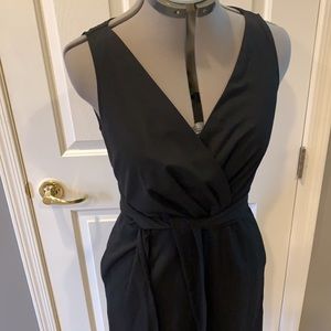 Black DKNYC dress with attached waist tie. LBD